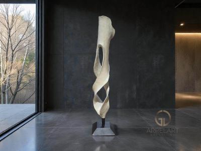 SCULTURA IN TEAK INTAGLIATA A FORMA DI SPIRALE