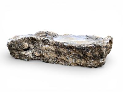 SKULPTURALER WASCHTISCH AUS NATURSTEIN PANIER