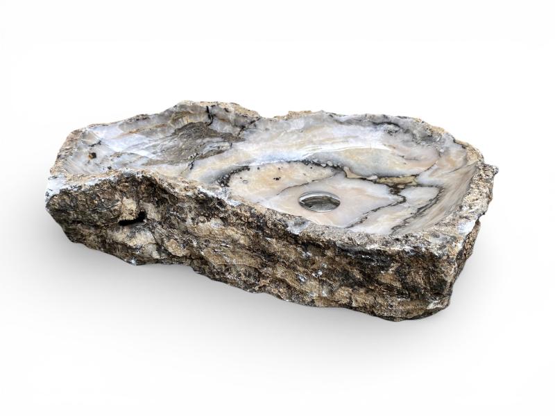 SKULPTURALER WASCHTISCH AUS NATURSTEIN PANIER